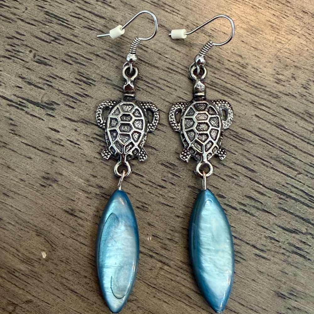 Handmade sea turtle earrings with blue shell pendants